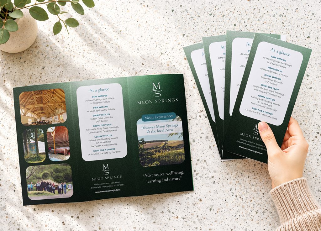 Meon Springs tri-fold brochure and leaflet designs laid flat showing brand identity