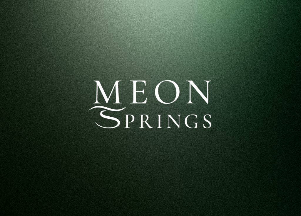 Meon Springs full wordmark on dark green textured background
